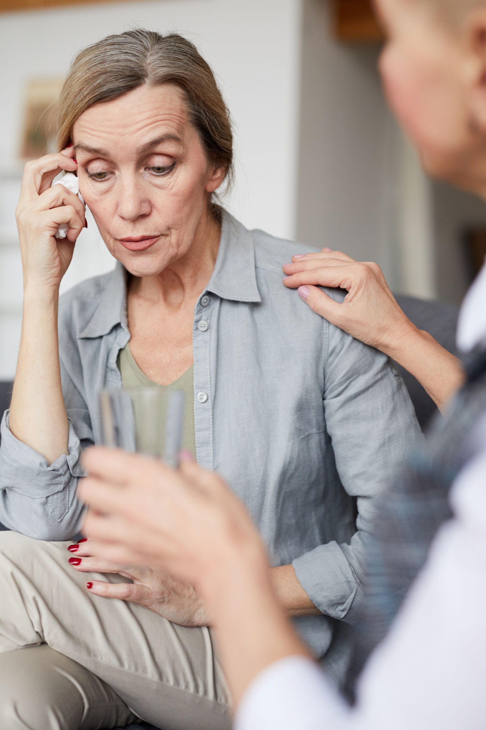 Crying Mature Woman in Therapy Session